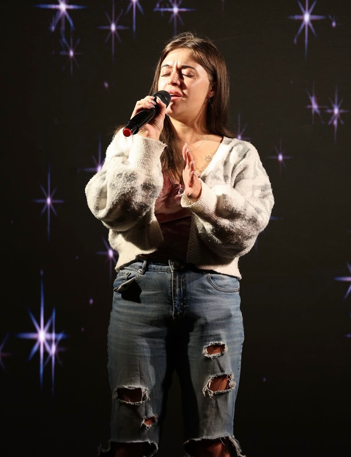 Lucy Armstrong performing live on stage